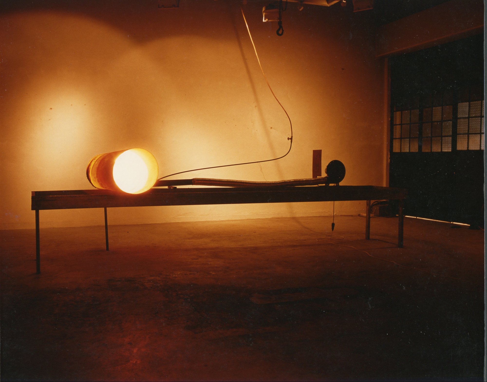 Thanasis Totsikas, Untitled, metal cylinder, pure petroleum, fan, 500 x 120 x 120 cm. Installation view, Hephaestus’ Workshop, Epikentro Gallery, Patras, 1989