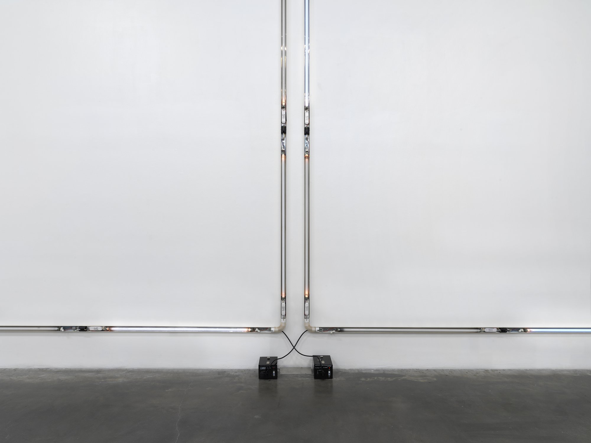 Iris Touliatou, Untitled (Still not over you), ceiling light fixtures, aluminium frame, fluorescents, wires, cable, transformers, 420 x 420 x 8 cm each, 2021. Installation view, New Museum Triennial, Soft Water Hard Stone, New Museum, New York, 2021