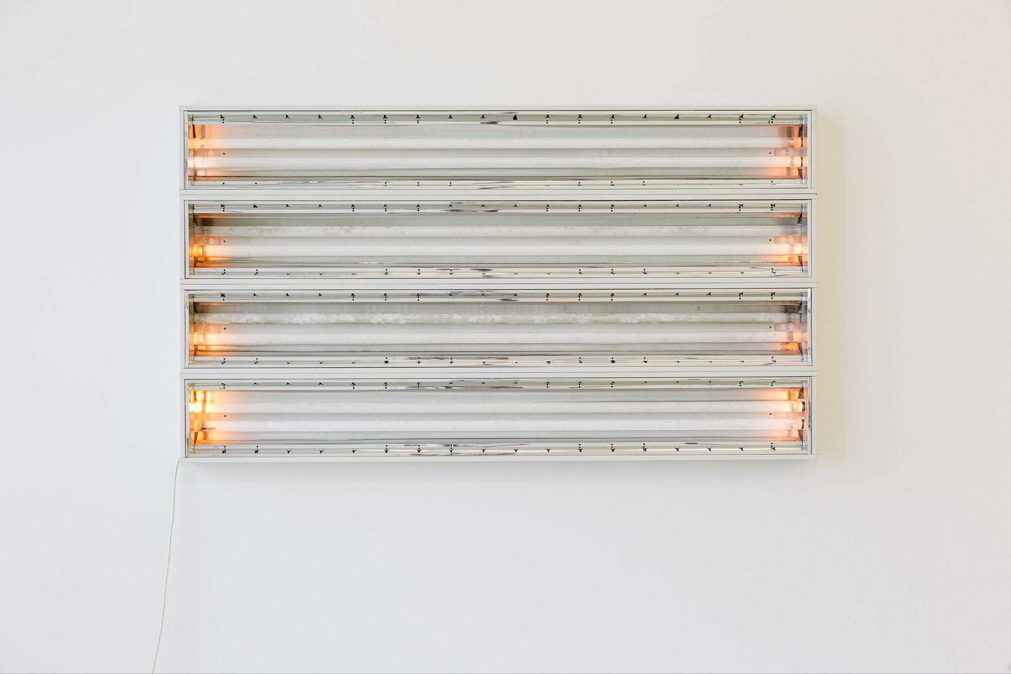 Iris Touliatou, Untitled (Still not over you), ceiling light fixtures, aluminium frame, fluorescents, wires, cable, 153 x 21 x 9 cm each, 2021. Installation view, Anti-Structure, DESTE Foundation, Athens, 2021