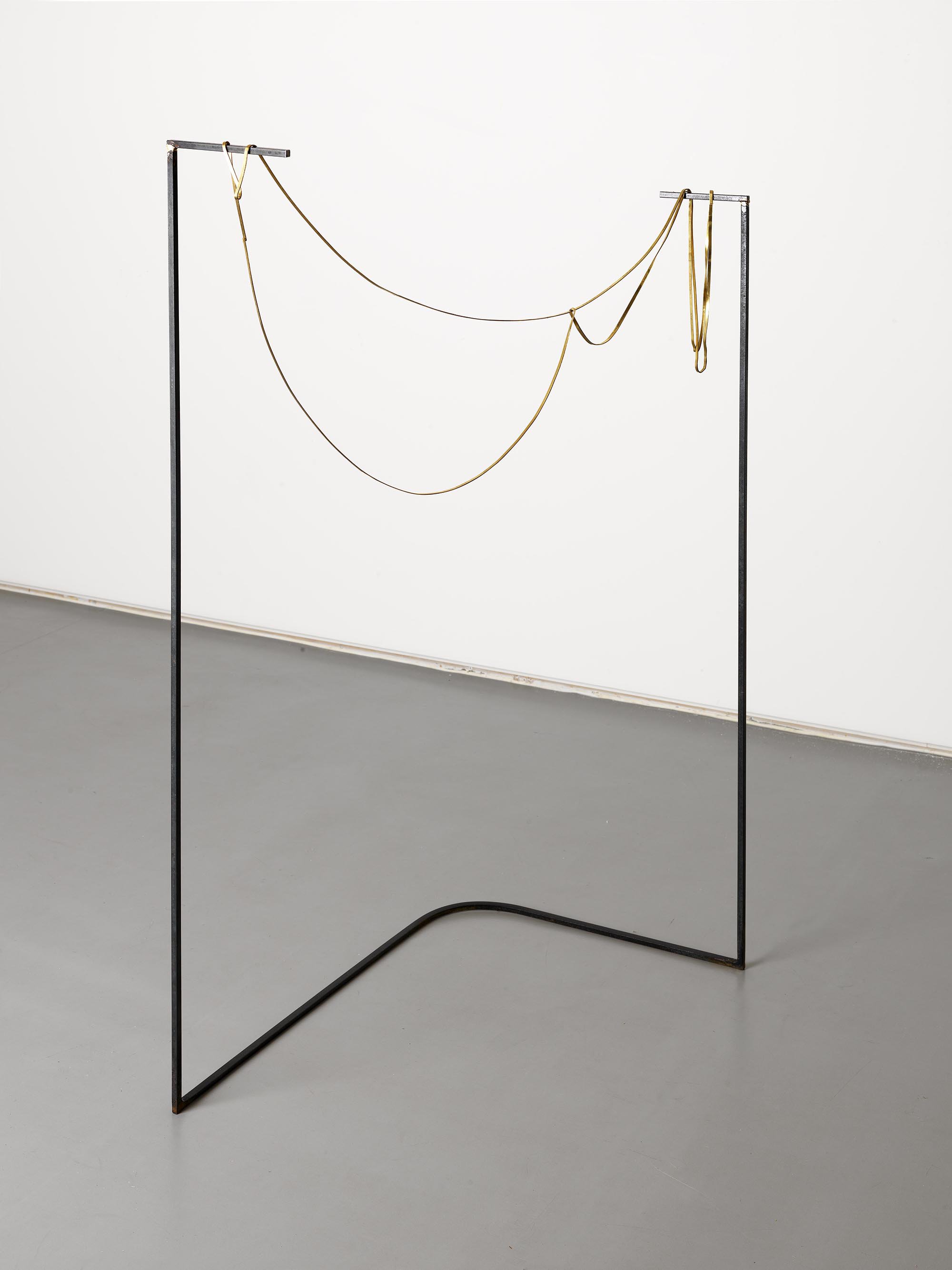Athanasios Argianas, Song Machine, photo-etched brass strip of the length of the artist’s height, mild steel, walnut, 100 x 160 cm (39 3/8 x 63 in), 2010. Installation view, Odd Time Beat, Rodeo, Istanbul, 2011