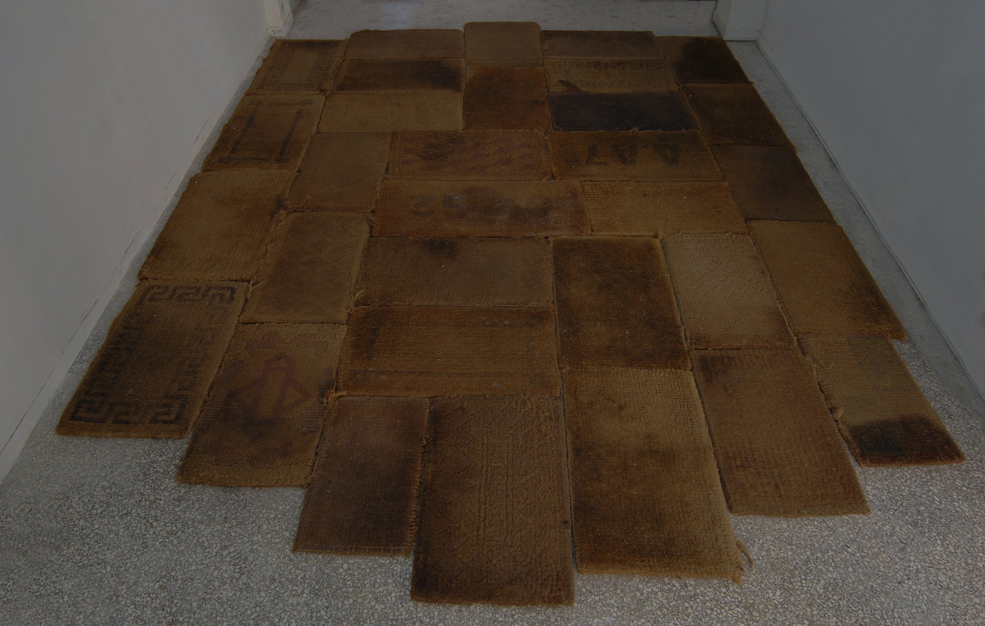 Eftihis Patsourakis, Skin, 32 exchanged sisal door mats from Athens, 500 x 400 cm (196 7/8 x 157 1/2 in), 2010