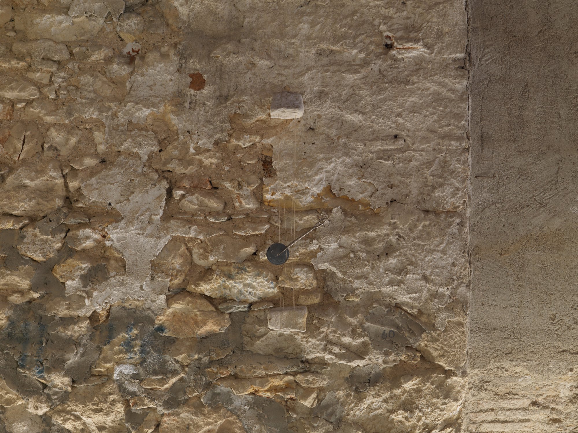 Koula Savvidou, No Man&#x27;s Land, stone, metal, graphite, rope, 101 x 27 x 14 cm, 1990-1995. Installation view, Χρόνος. Και Χρόνος Ξανά, Rodeo, Piraeus, 2022