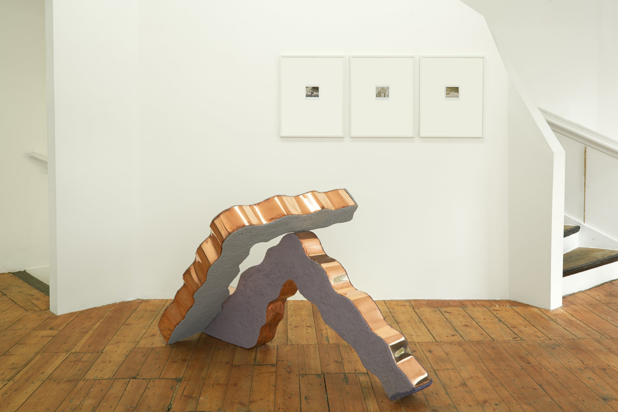 Tamara Henderson, Treaty of Slippage: Wake of Limbs, copper, paint, sand, glue, wood, 90 x 157.5 x 94.5 cm (35 3/8 x 62 x 37 1/4 in), 2014(On wall) Haris Epaminonda, Untitled #08, Untitled #311, Untitled #371, polaroids, 10.3 x 10.2 cm each (4 x 4 in each); 58 x 46 cm framed (22 7/8 x 18 1/8 in framed), 2008 – 2009