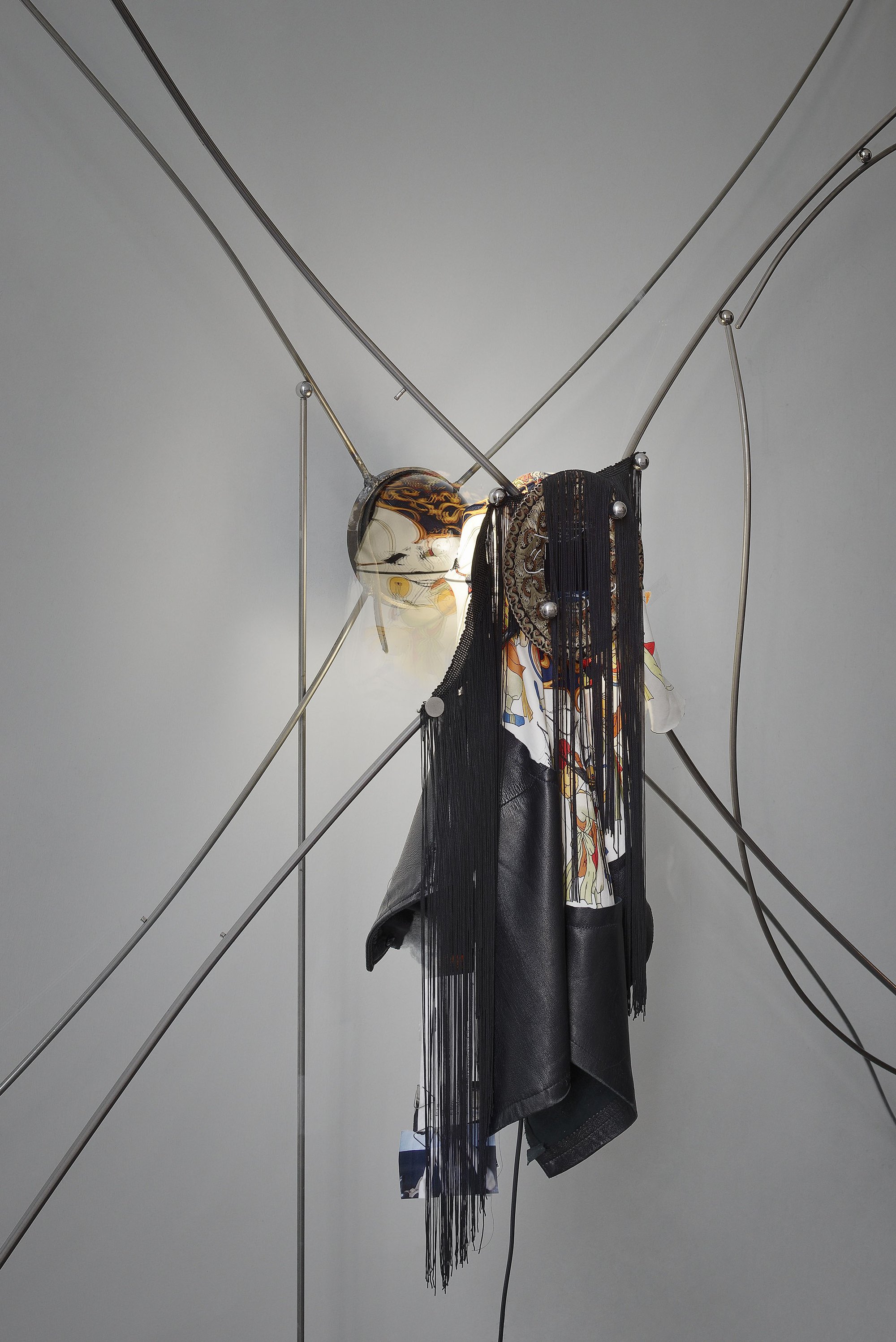 David Douard, Acte de salon, detail, metal, glass, fabric, magnet, light, ceramic mask, 2018