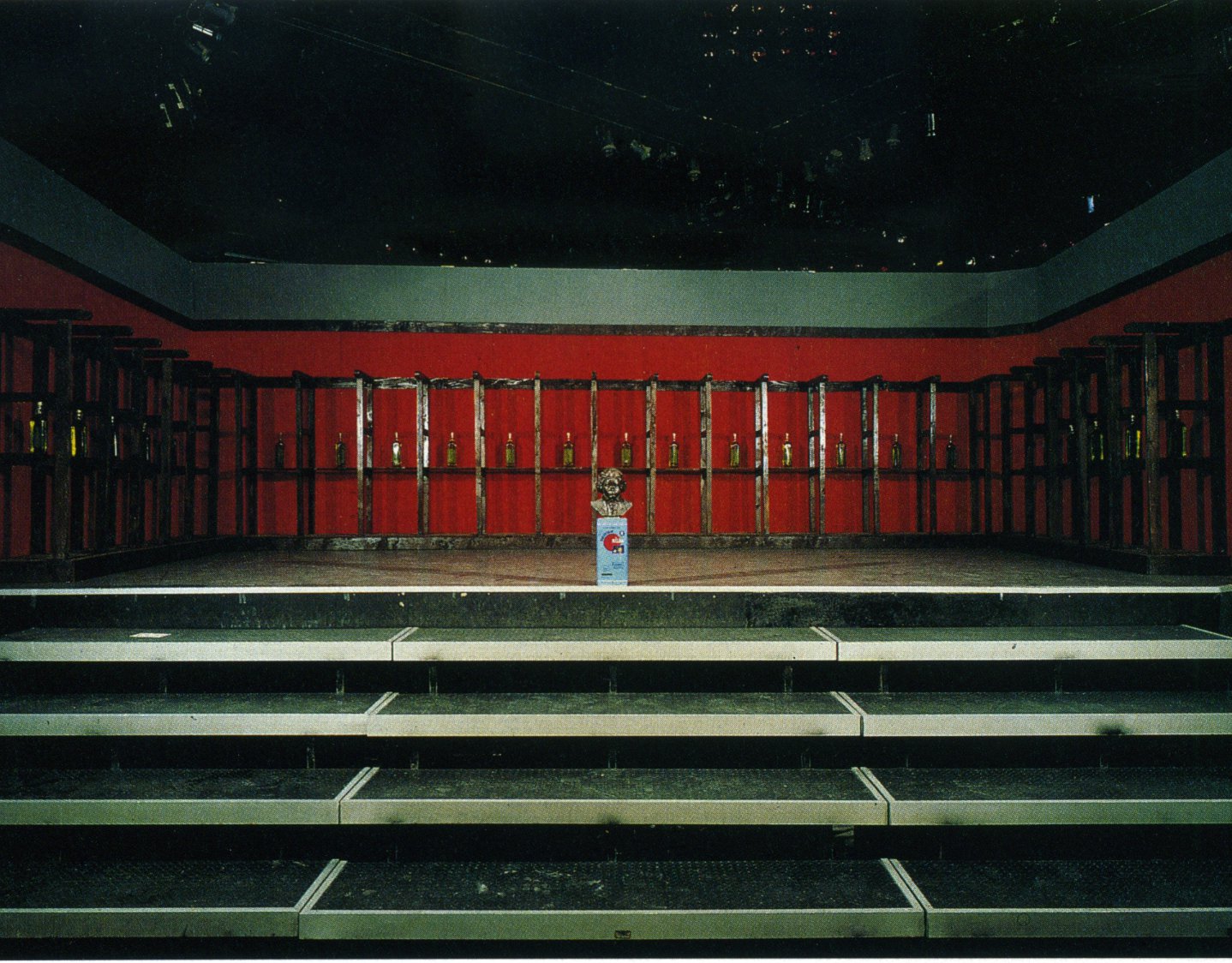 Thanasis Totsikas, Untitled, metal, red blankets, oil, wooden pews, 700 x 500 x 220 cm, 1988. Installation view, Hyper-product, Club 22, Athens, 1988
